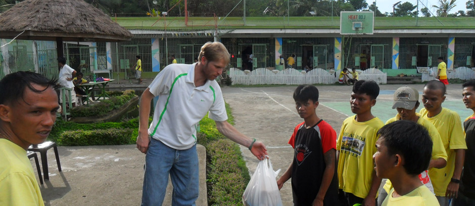 Giving care packages to the inmates of a prison in the Philippines
